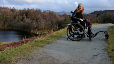 Carrie-Ann Lightley is taking a walk around a lake in her wheelchair