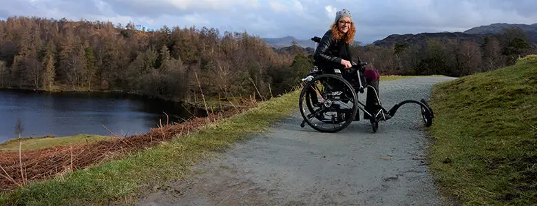 Carrie-Ann Lightley is taking a walk around a lake in her wheelchair