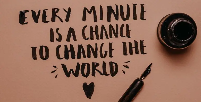 Every minute is a chance to change the world written on pink paper