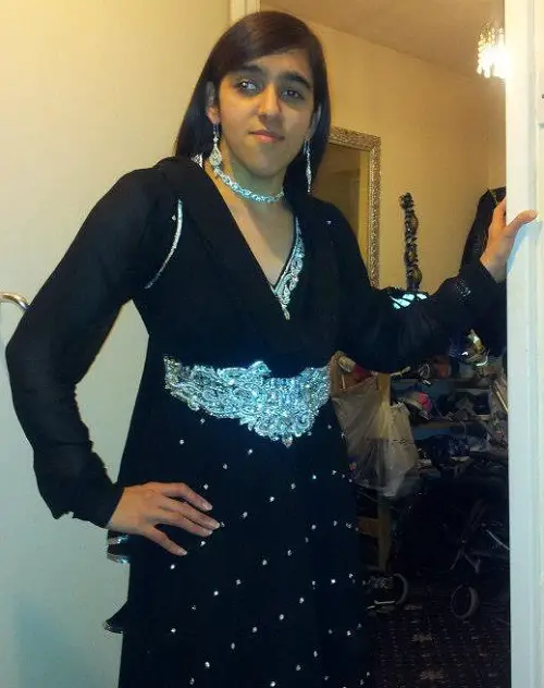 Zubee Kibria wearing a black and silver embellished sari