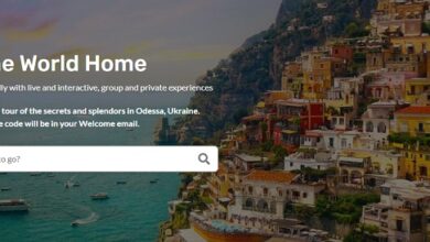 Beeyonder virtual travel website homepage showing an image of a coastline and houses cut into the mountains