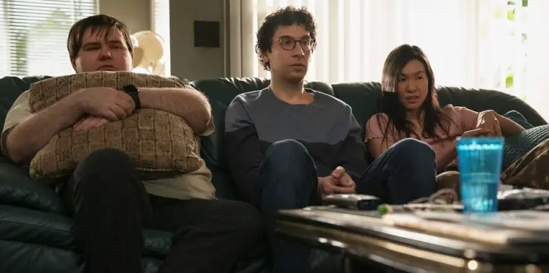 Rick Glassman, who plays Jack, Albert Rutecki, who plays Harrison, and Sue Ann Pie, who plays Violet in As We See It sitting on a sofa watching TV