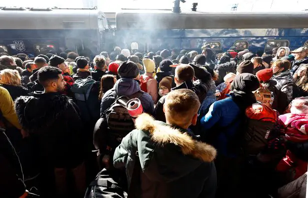 People in Ukraine waiting to board an evacuation train from Kyiv to Lviv at Kyiv central train station, Ukraine as Russian forces advance on the capital (Image: REUTERS)