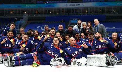 USA ice hockey team with gold medals Credit - IPC