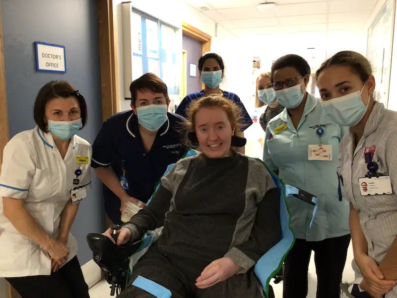 Rebecca surrounded by her hospital Team