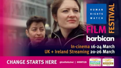 A head and shoulders shot of two women. The txt reads Human Rights Watch Film Festival. Barbican. In cinemas 16th - 24th March. UK and Ireland Streaming 20th to 26th March