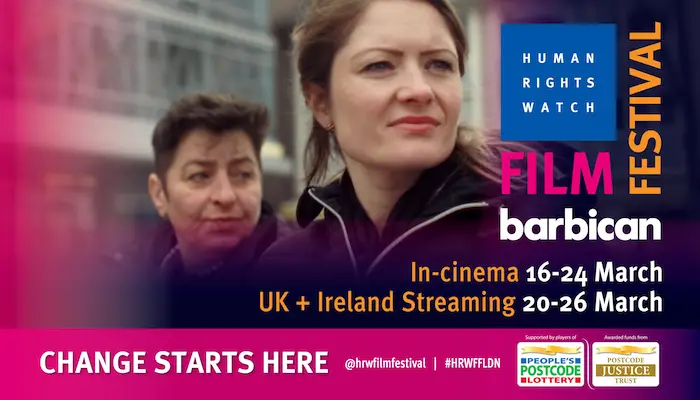 A head and shoulders shot of two women. The txt reads Human Rights Watch Film Festival. Barbican. In cinemas 16th - 24th March. UK and Ireland Streaming 20th to 26th March
