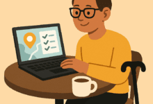 Flat cartoon illustration of a disabled traveler with short brown hair, glasses, and a hearing aid, sitting at a café table with a laptop. A coffee cup sits on the table and a cane leans against the chair. The laptop screen shows a map and a checklist.