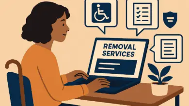 Flat cartoon scene of a disabled person at a desk comparing removal services on a laptop, surrounded by icons showing ramps, checklists, and insurance papers.