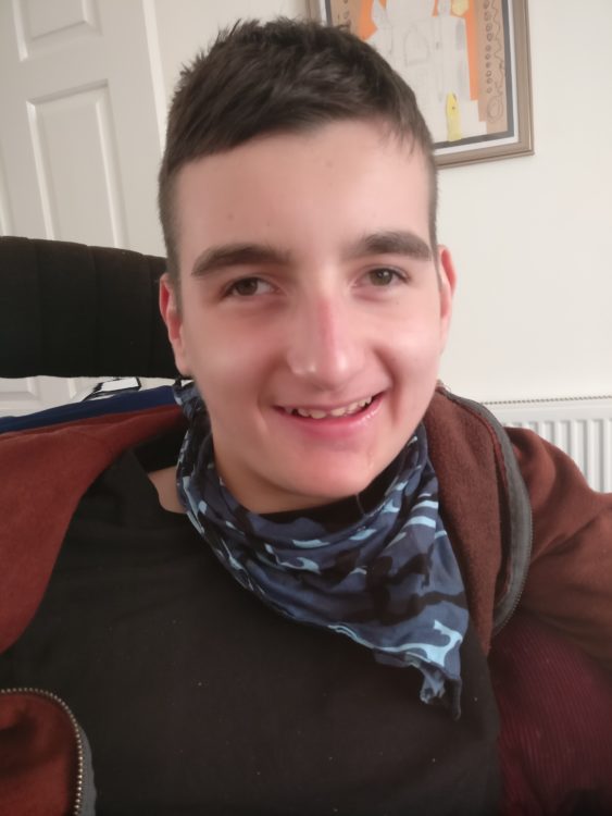 Joe smiling with a neckerchief