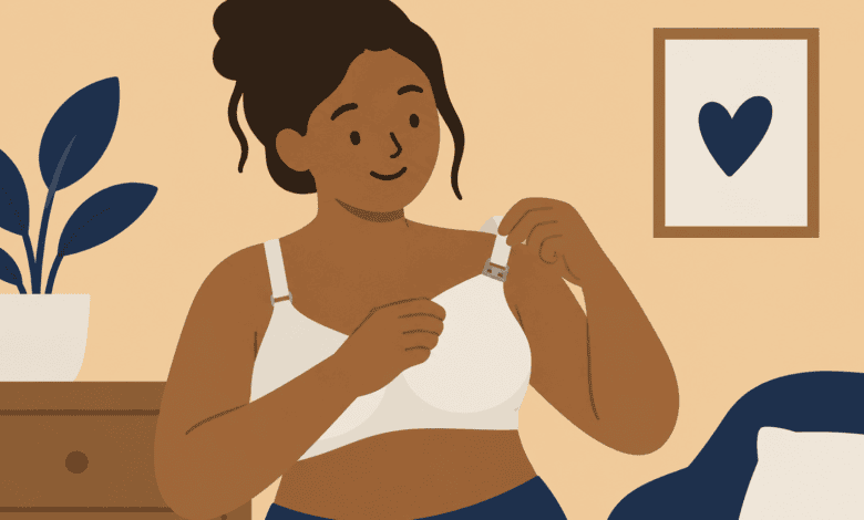 Disabled woman using one hand to adjust the clip on an adaptive nursing bra.